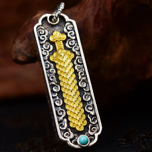 Coin Sword pendant front view — handcrafted coin sword charm with layered ancient coin motifs — DAO Chant
