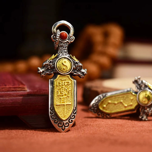 Dragon Sword pendant front view — handcrafted dragon sword charm with Nan Hong Agate stone inlays — DAO Chant