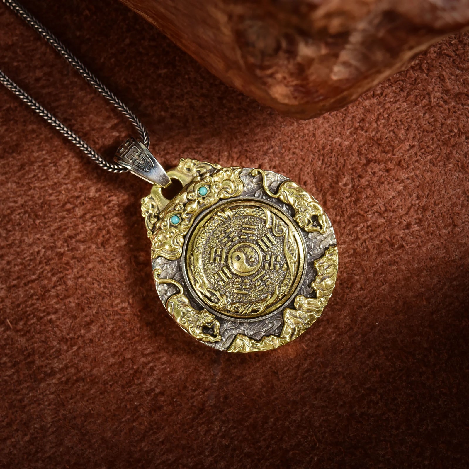 Taichi Bagua coin pendant front view — twin dragon heads with Nan Hong Agate and Turquoise inlays — DAO Chant