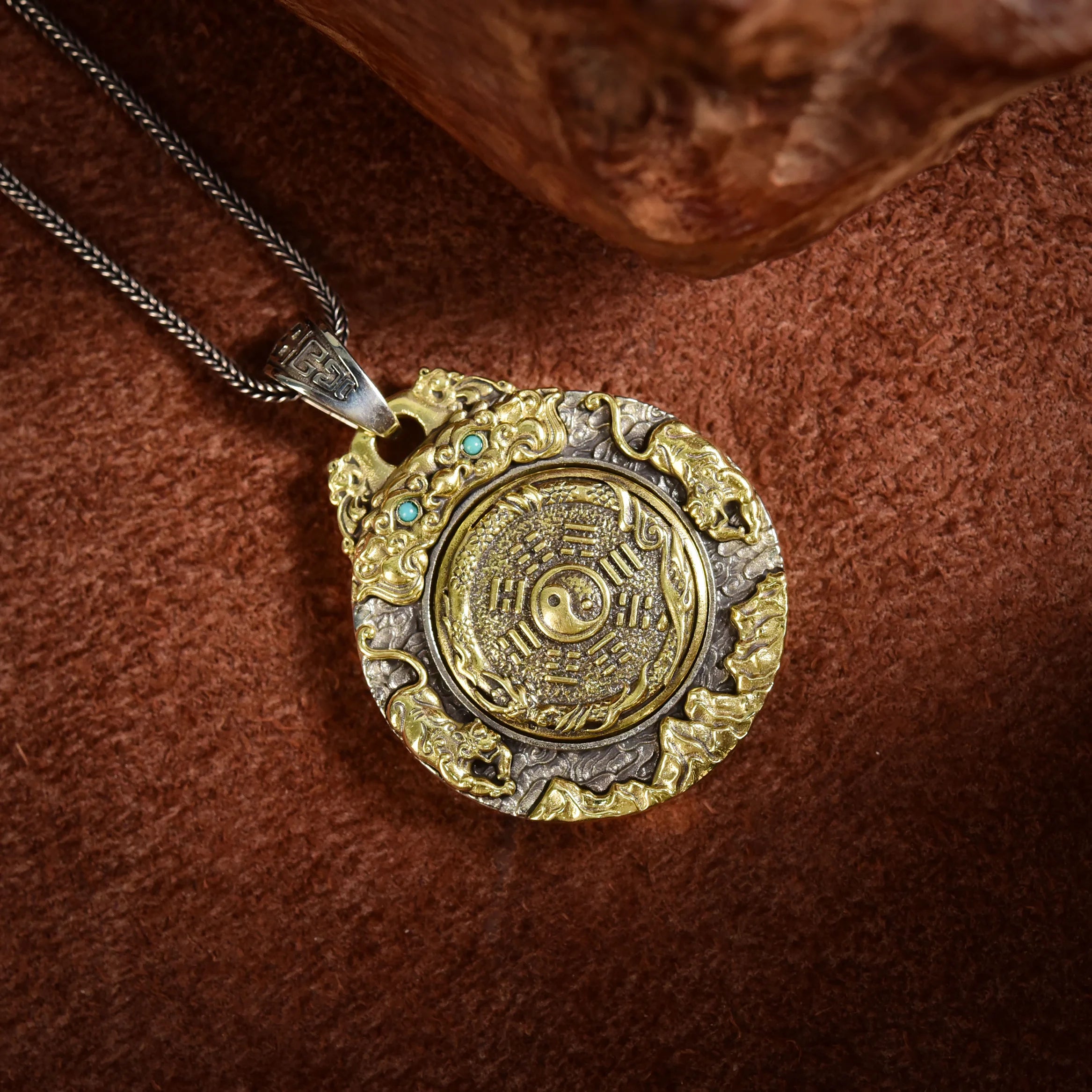Taichi Bagua coin pendant front view — twin dragon heads with Nan Hong Agate and Turquoise inlays — DAO Chant